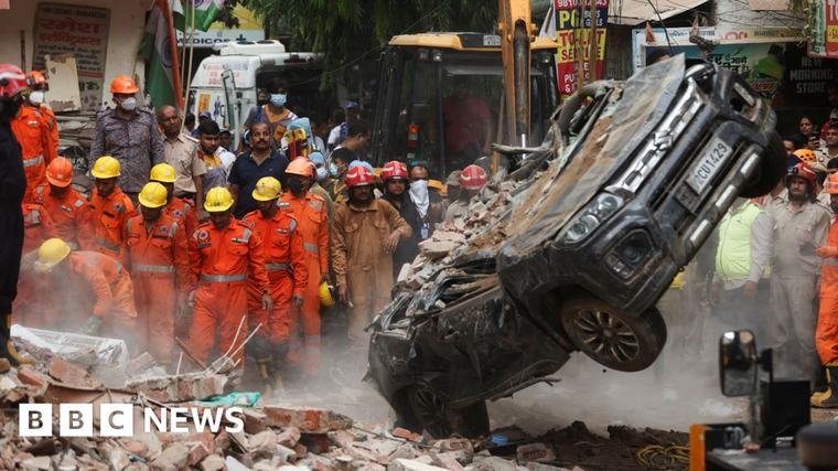 Dozens feared trapped in collapsed building in Delhi As many as 50 people are thought to have been inside the five-storey hostel when it came down. 9 hrs ago Asia